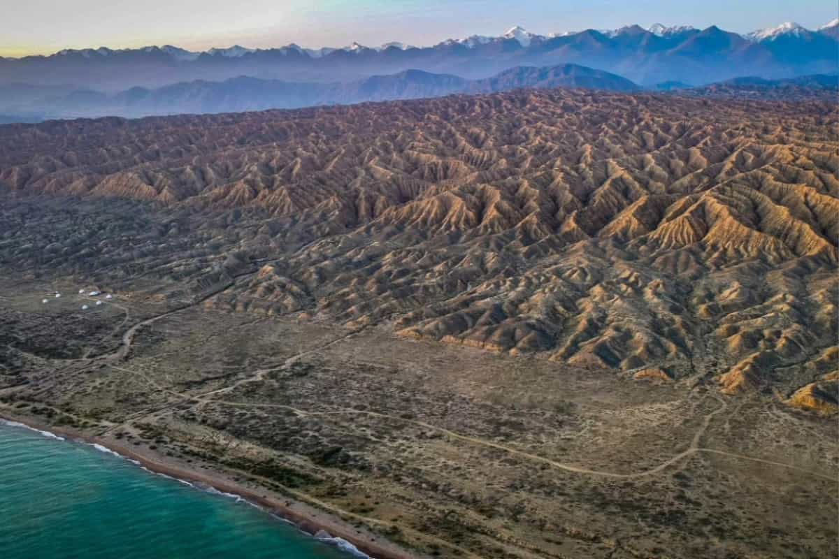 Aerial view of Feel Nomad Yurt Camp on Issyk Kul shore, Kyrgyzstan