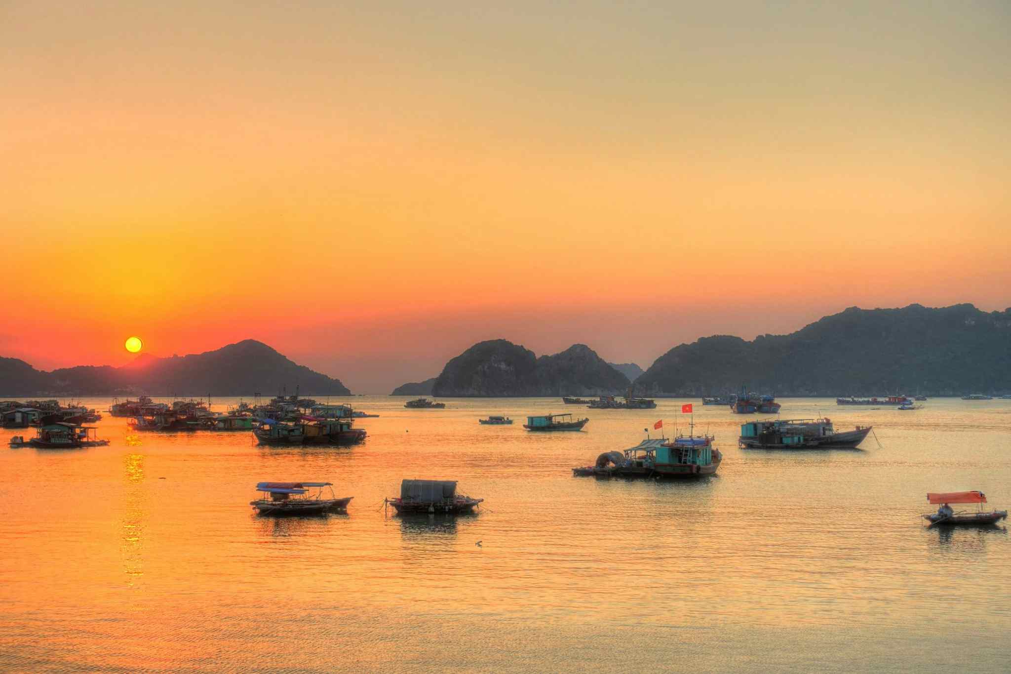 CANVA - Sunset over Cat Ba Island in Vietnam. Photo: Canva link: https://www.canva.com/photos/MADmgOkFmd4-cat-ba-island-vietnam/

