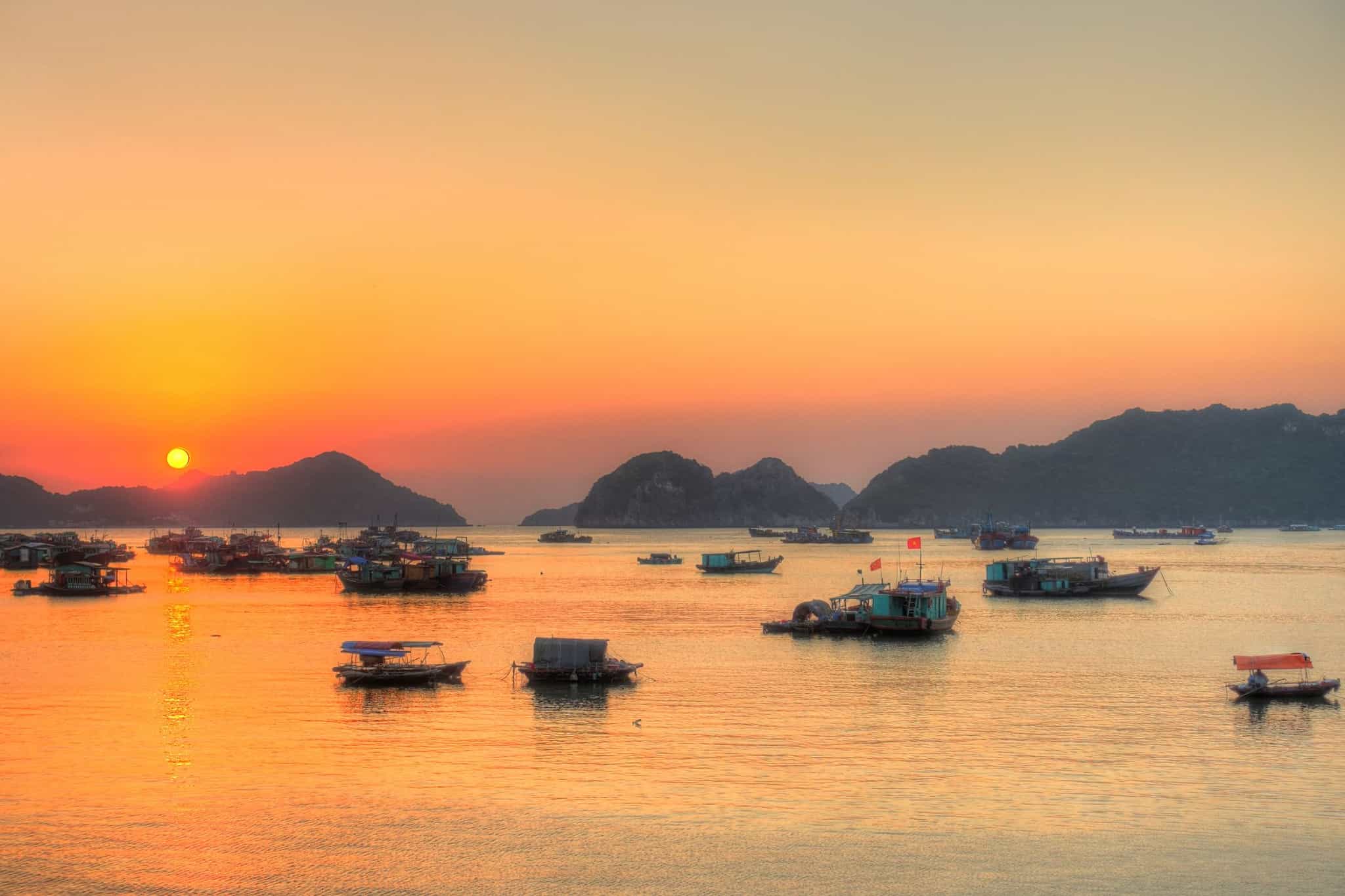 CANVA - Sunset over Cat Ba Island in Vietnam. Photo: Canva link: https://www.canva.com/photos/MADmgOkFmd4-cat-ba-island-vietnam/
