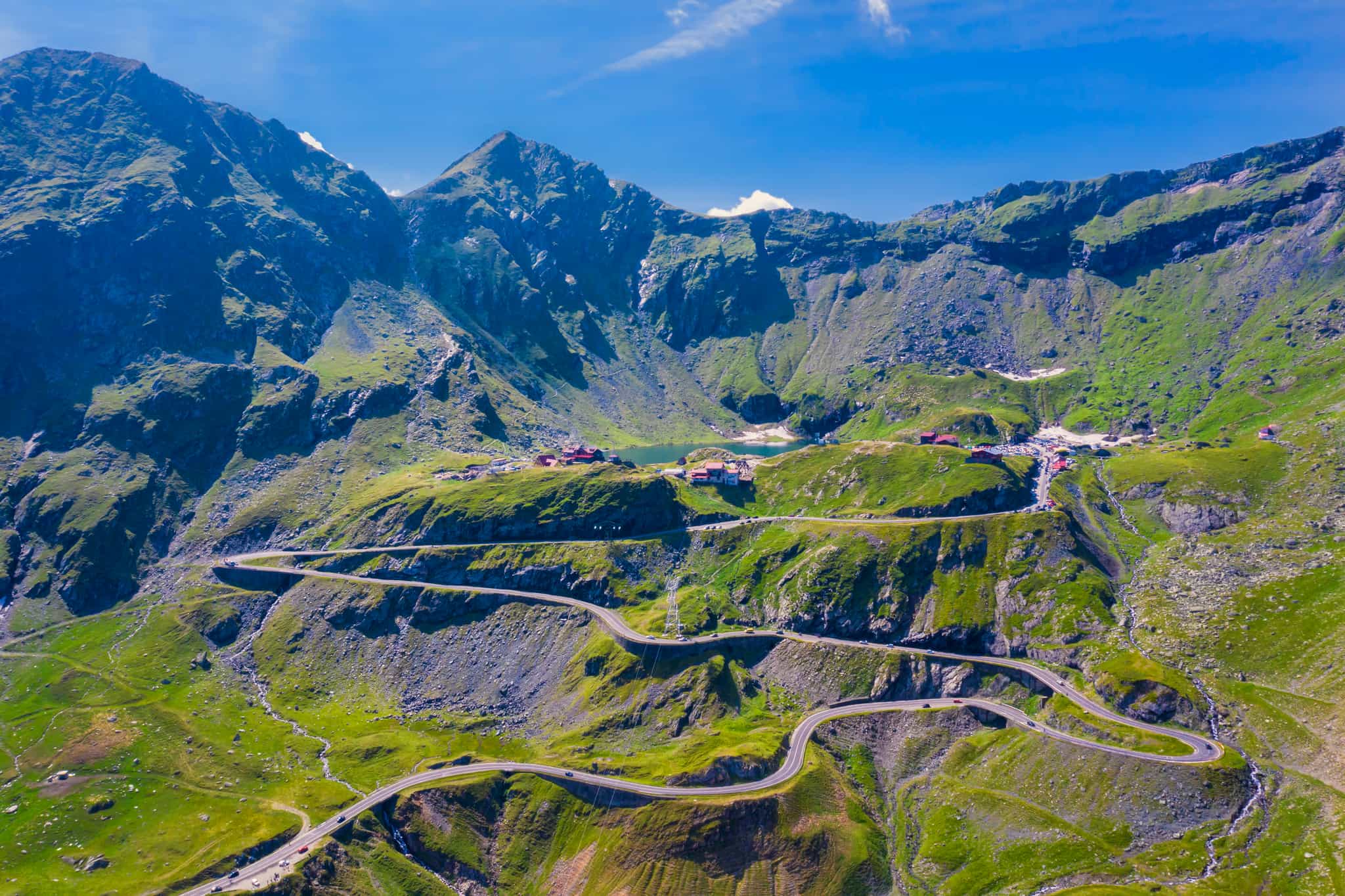 Aerial view of the sunny Transfagarasan road with Fagaras Mountains, Romania in summer