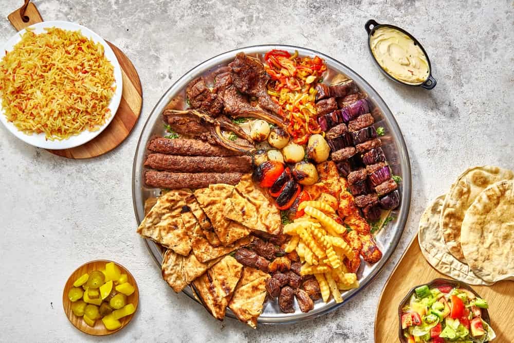 Middle Eastern cuisine with a variety of mezze with mixed veggies