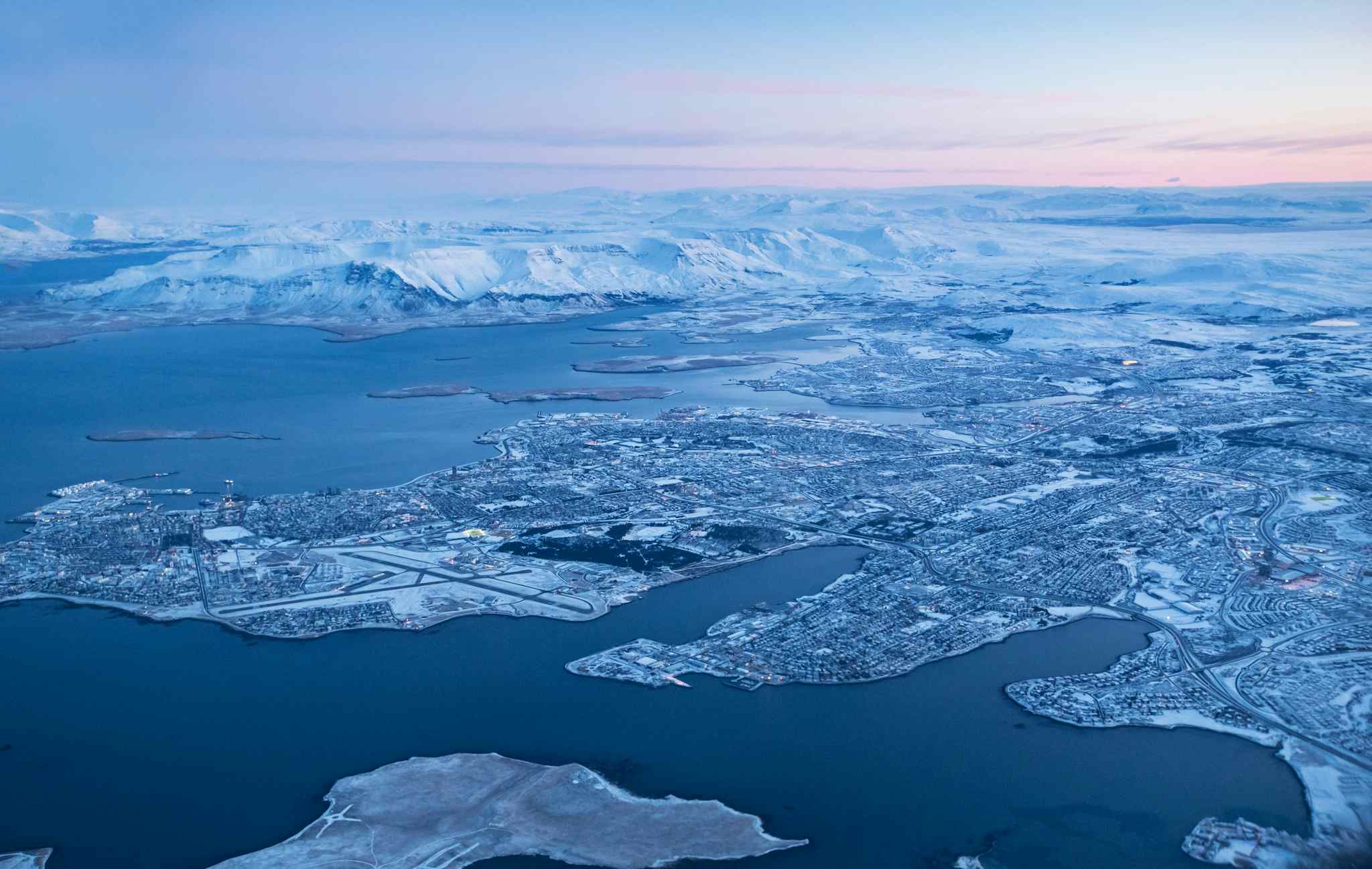 View of Keflavik city in winter through airplane window, Iceland. Photo: GettyImages-900699846