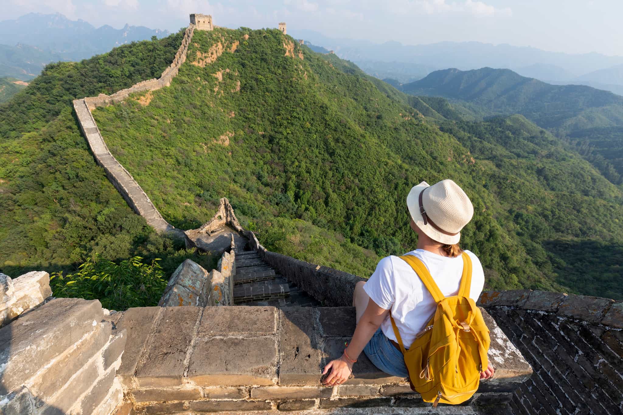 Hiker looking over the Great Wall of China. Photo: shutterstock 2696582303