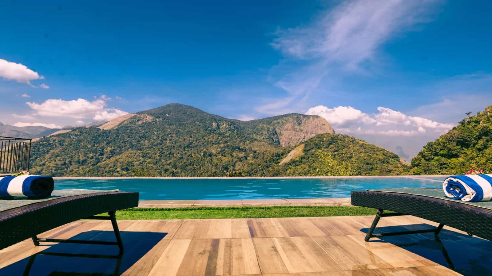 View of the pool and mountains from Shola Crown, Vattavada, Kerala, India