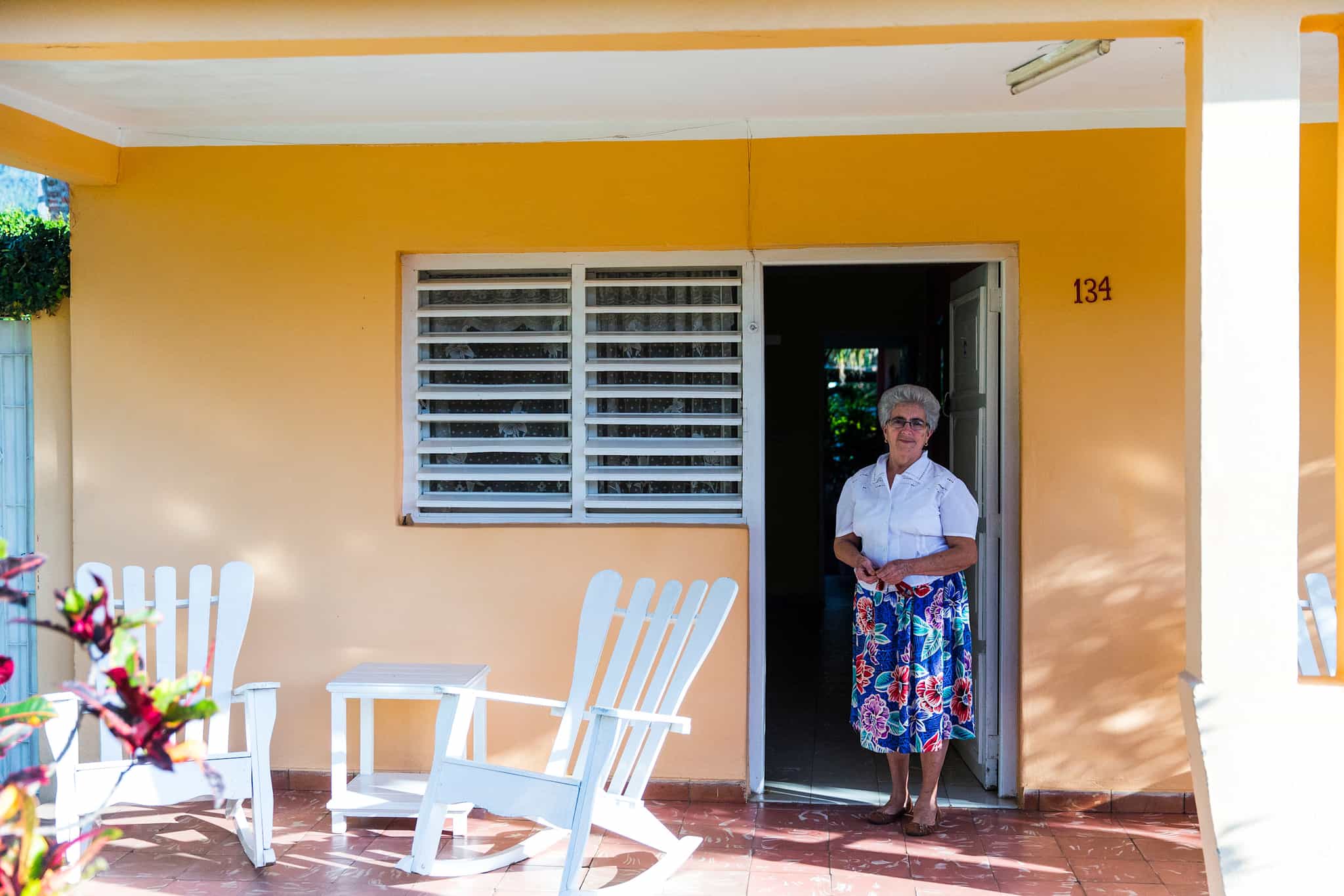 Host outside Cienfuegos Casa Particular, Cuba