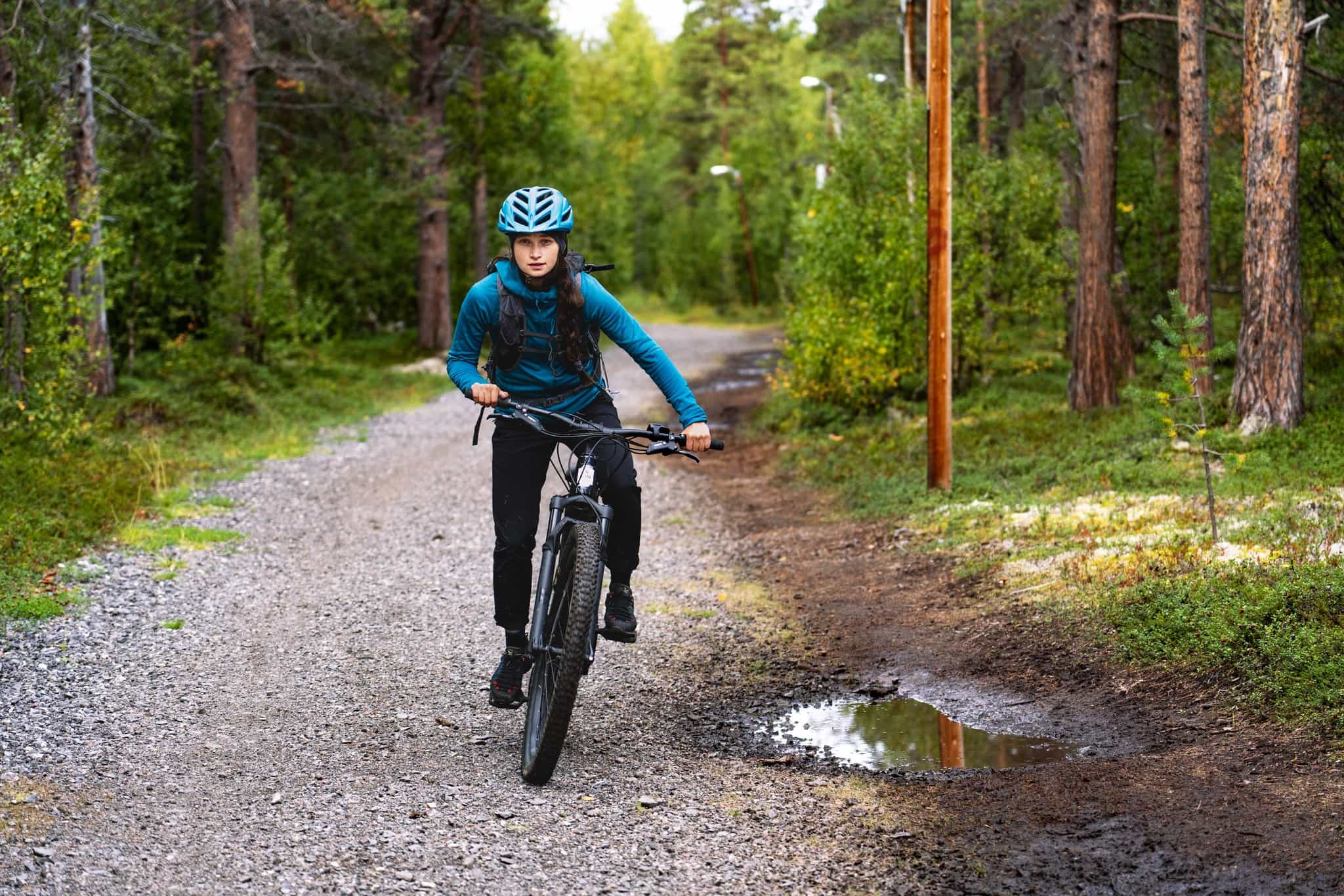 E-biking in a forest in northern Norway