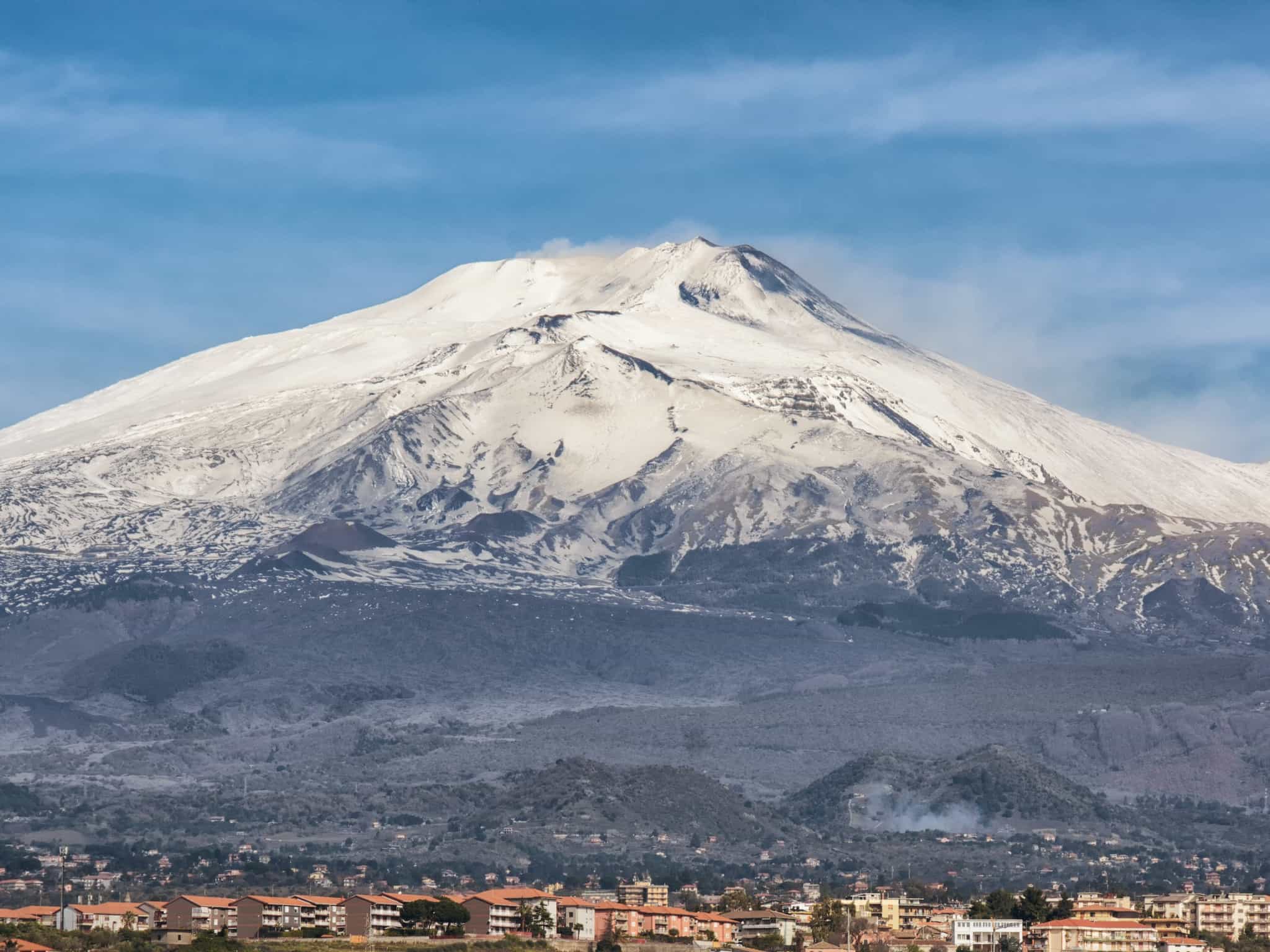 View of snowy Etna from Catania, Italy. Photo: GettyImages-930546050