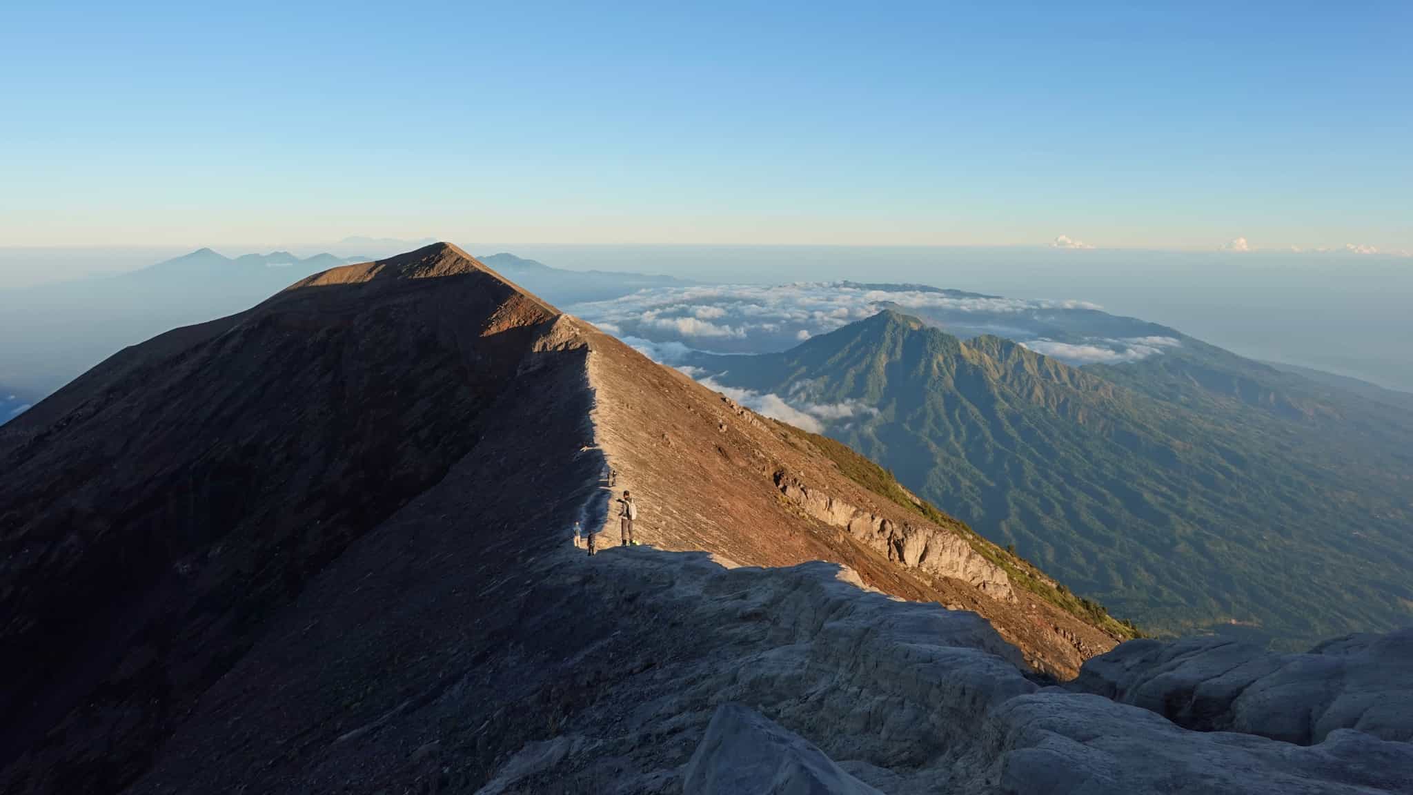 Trekkers on the ridge of Mount Agung, Indonesia