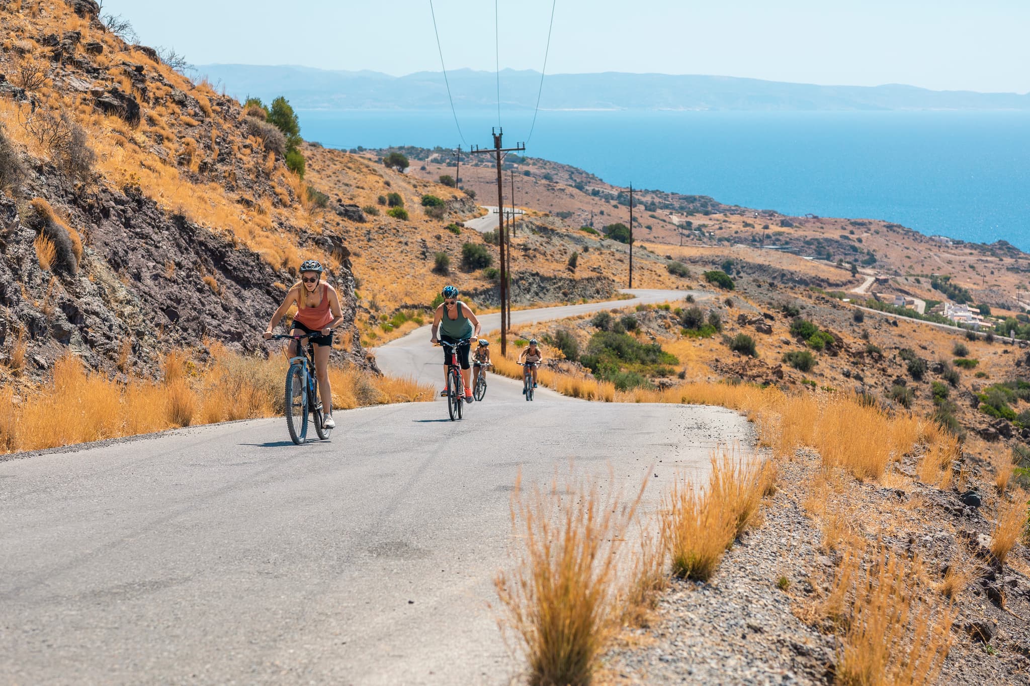 A graphic of a cyclist going up a hill
