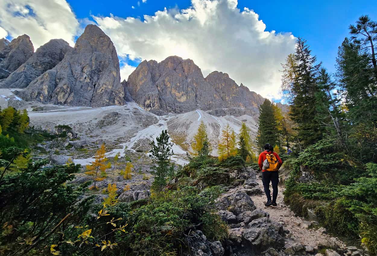Hiker in the Val Di Funes along the Adolf Munkel Trail