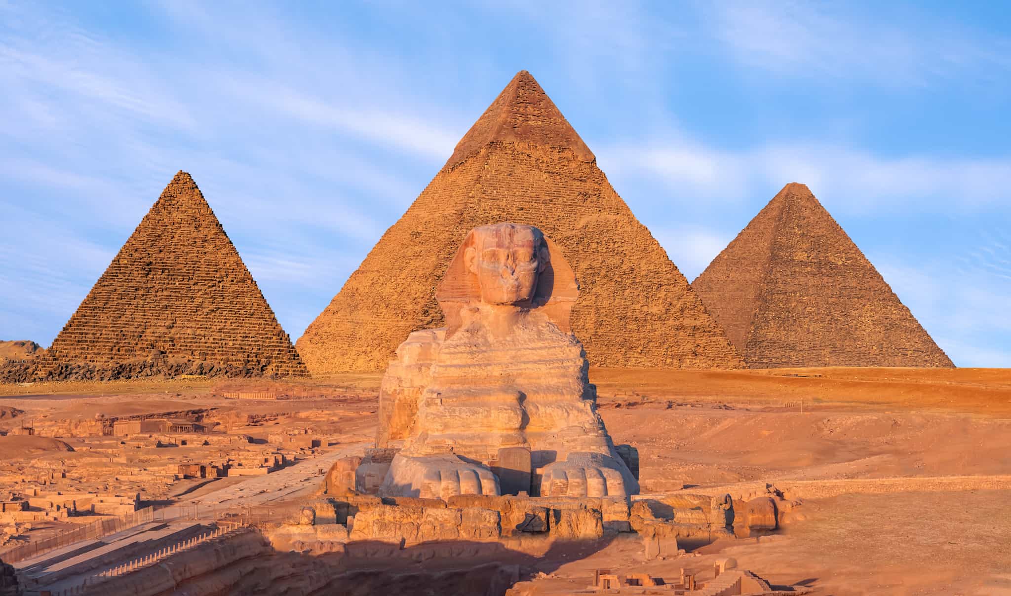 Giza Pyramids and the Sphinx. Photo: shutterstock 2564793319