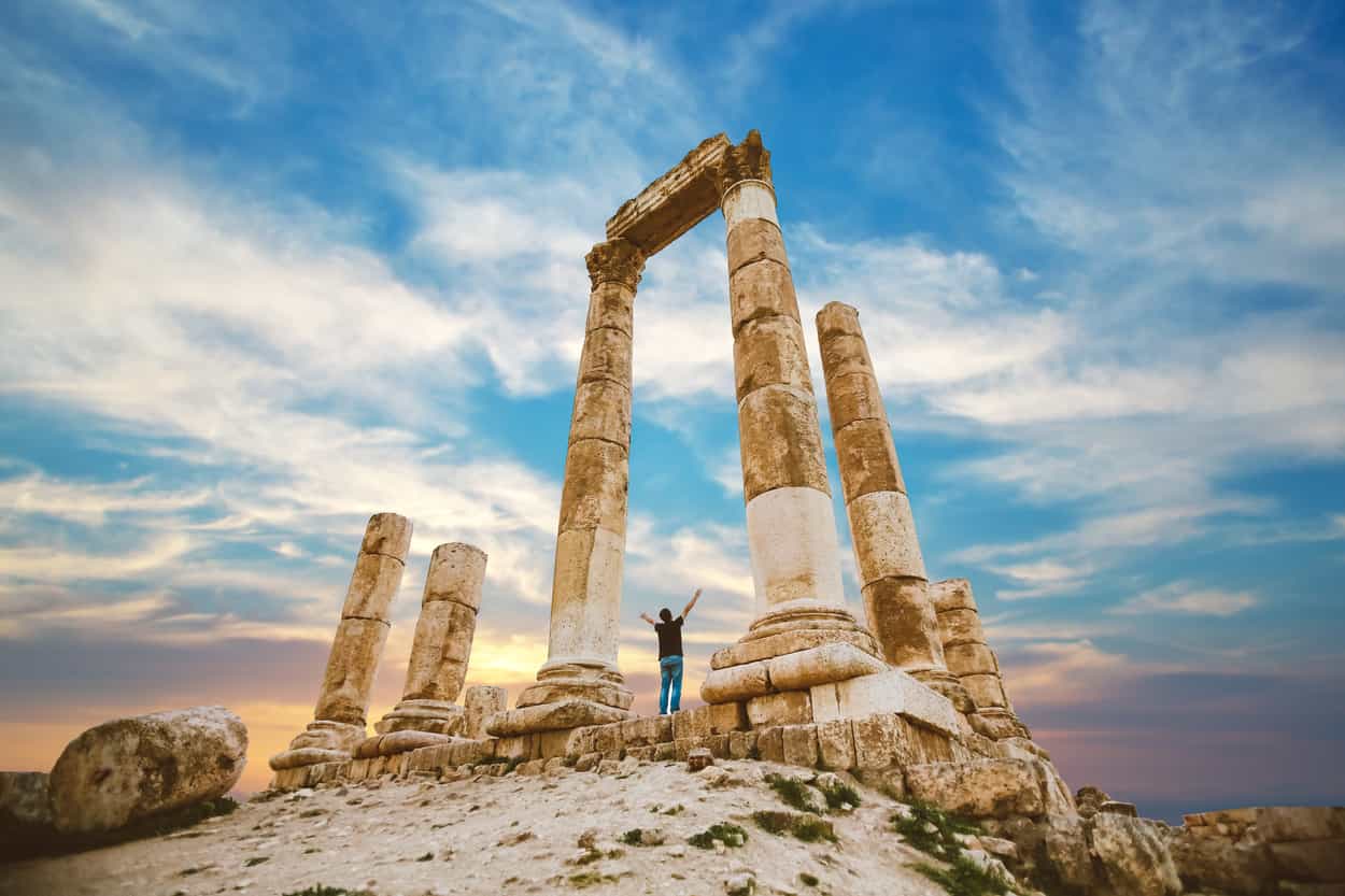 Person standing by the Historic Citadel in Amman, Jordan.