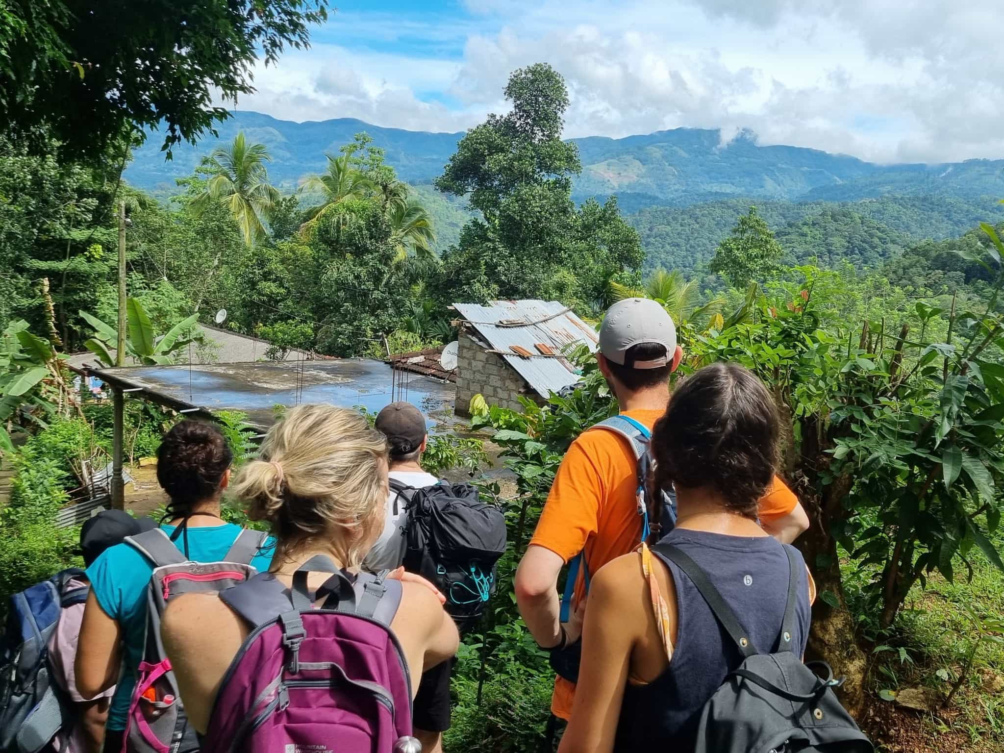 A group of hikers trekking near Kandy, Sri Lanka.