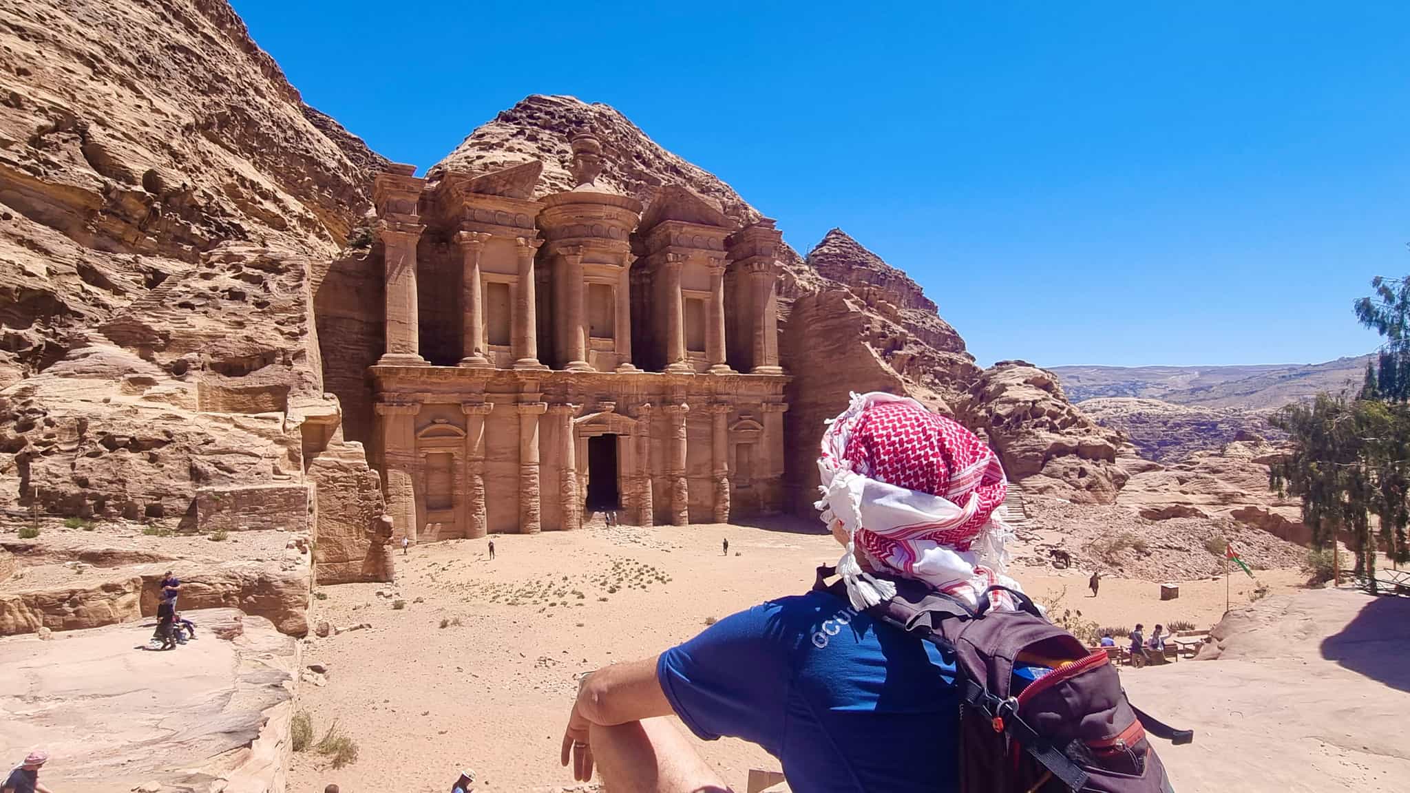 Hiker posing by the Petra Monastery, Jordan