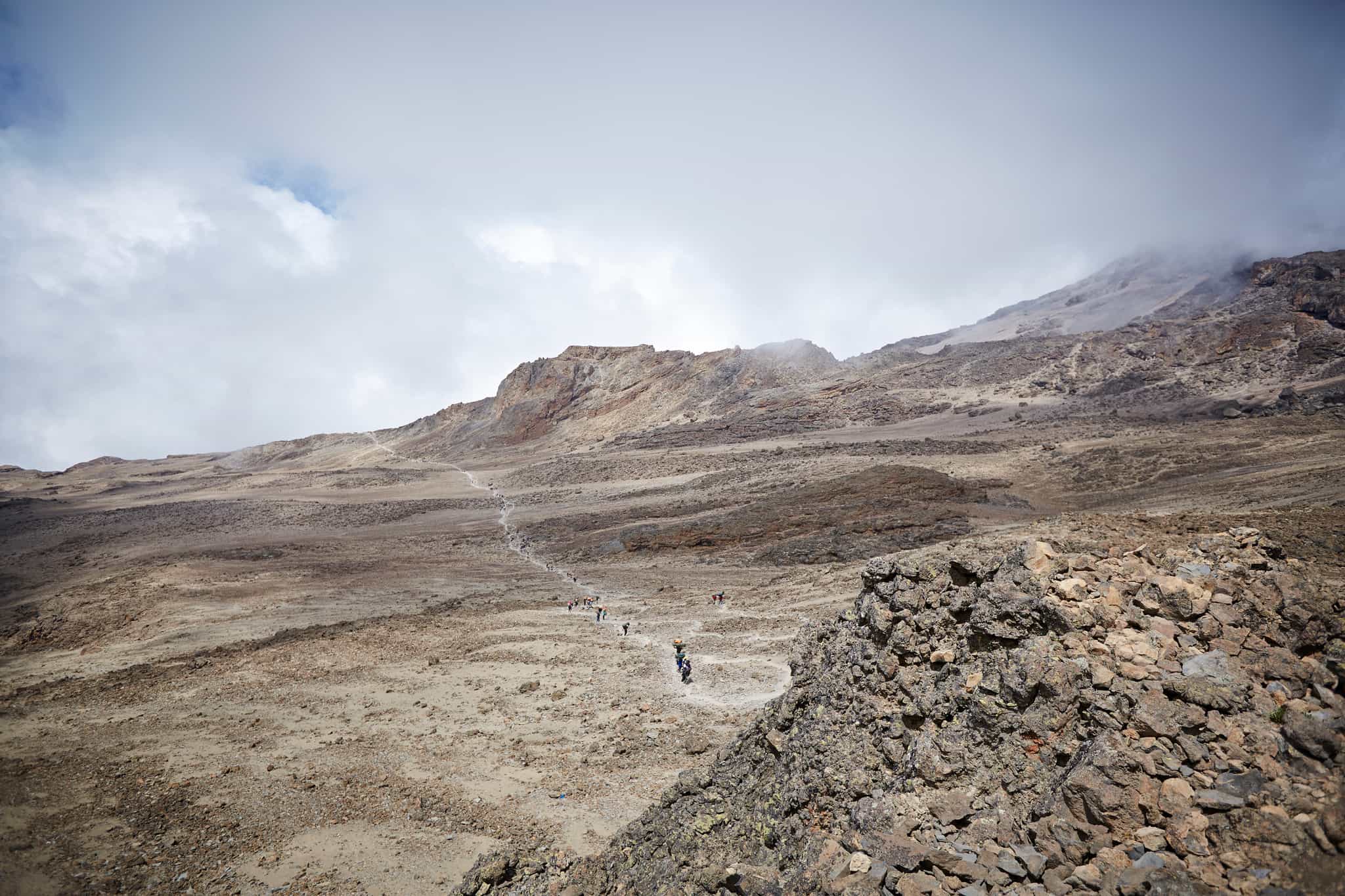 Hikers following the Machame trail towards Barafu Camp, Kilimanjaro, Tanzania.