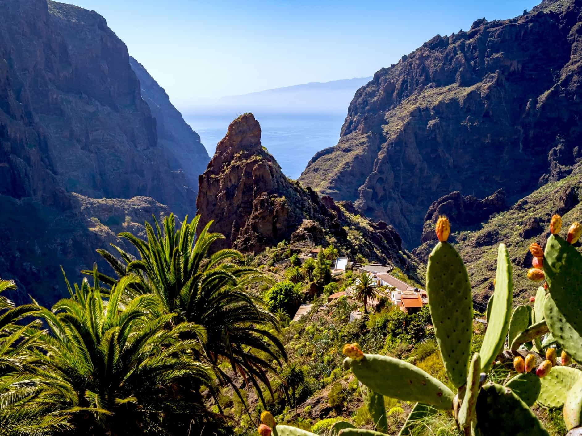 Hidden village in the Masca gorge and view of the Atlantic Ocean, Tenerife.