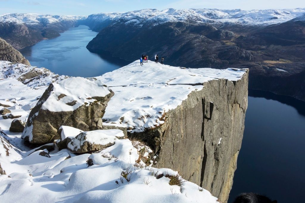 Preikestolen, the huge, cubic rock, looking out over the Lysefjord in Norway.