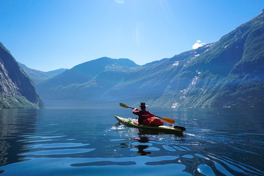 A kayaker on Geirangerfjord, in Norway