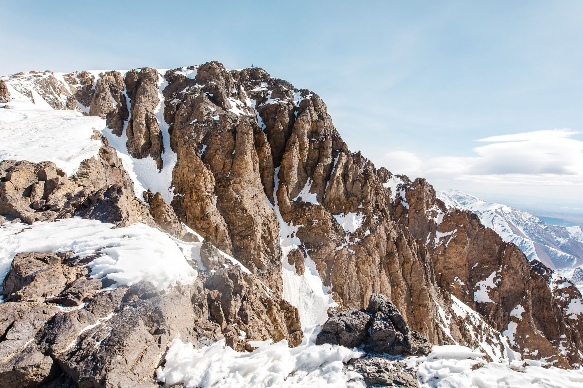 The rocky, snowy summit of Mount Toubkal