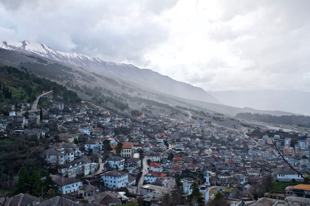 Town-Albania A mountain town on the slopes of a mountain face in Albania.