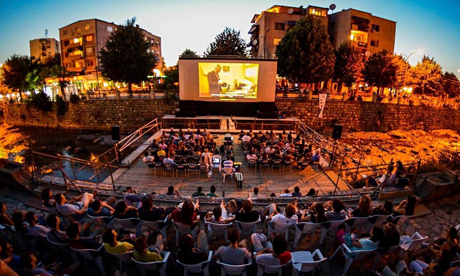 A film being shown outdoors at Dokufest in Kosovo