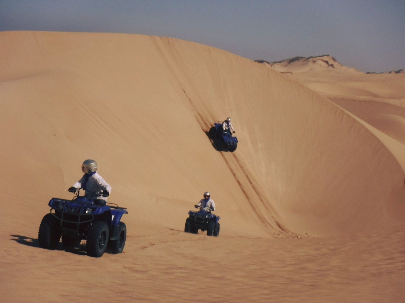 Quad bike, Essaouira desert, Morocco Quad bikers in Essaouira desert,Morocco