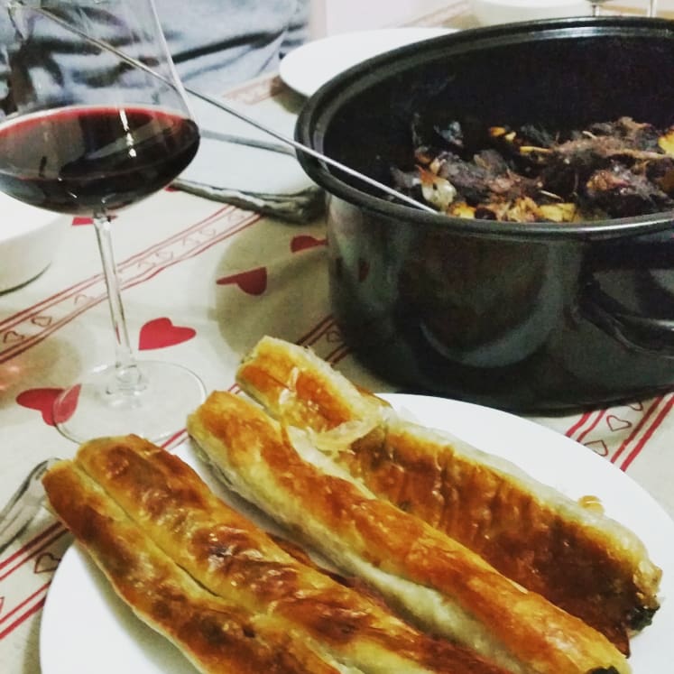 Wild boar casserole and borek, traditional Albanian food