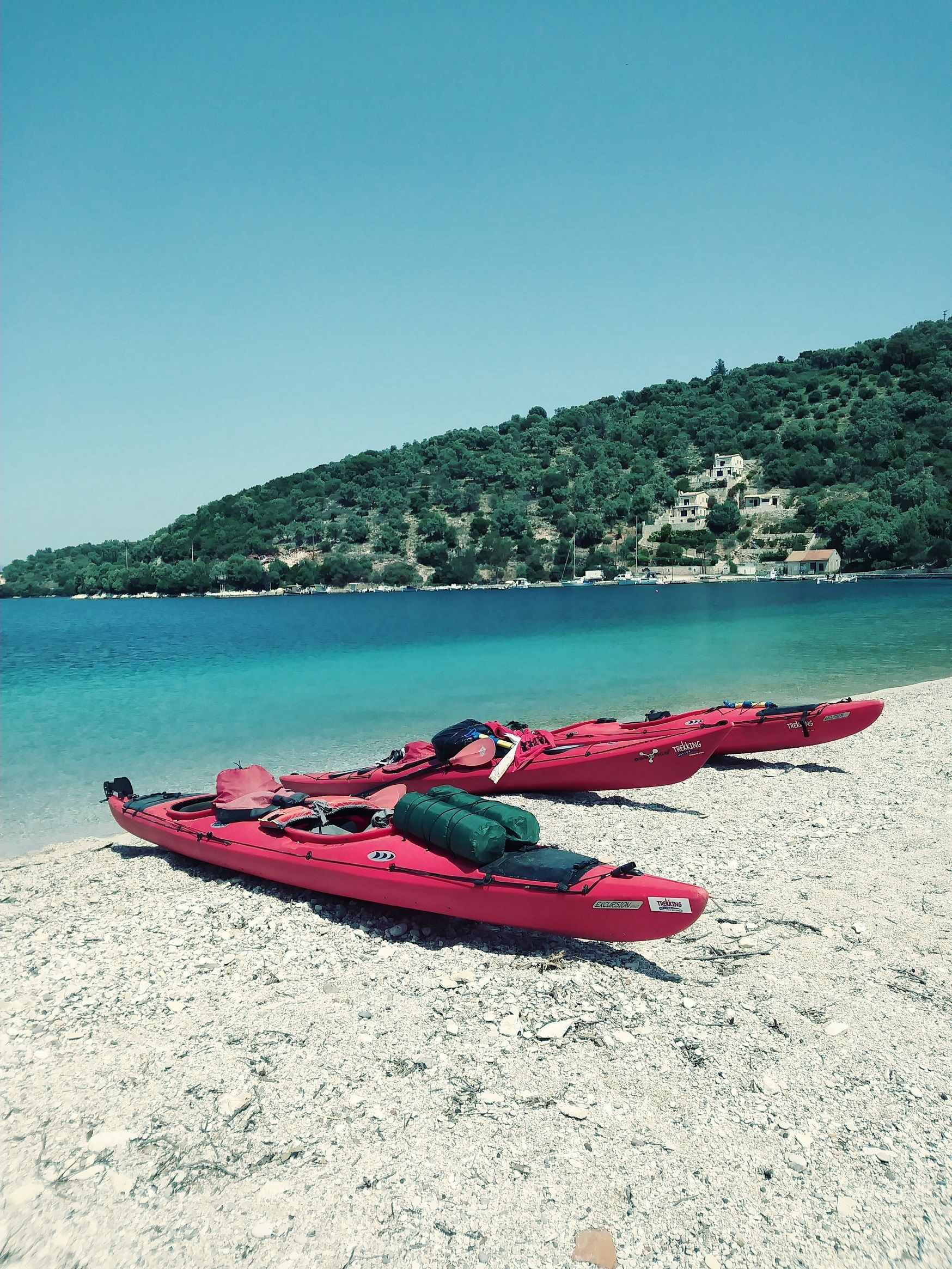 Two kayaks ashore on the Meganisi Coast, Greece