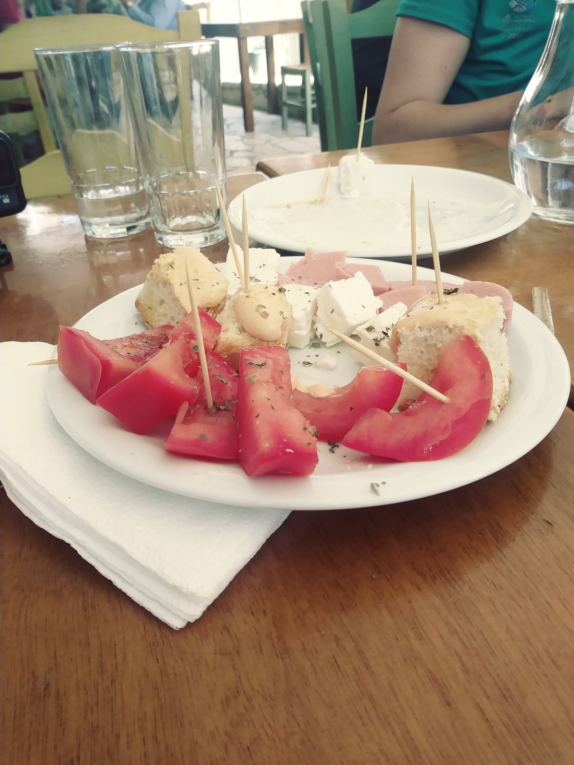 Snacks of tomato and feta cheese in Greece