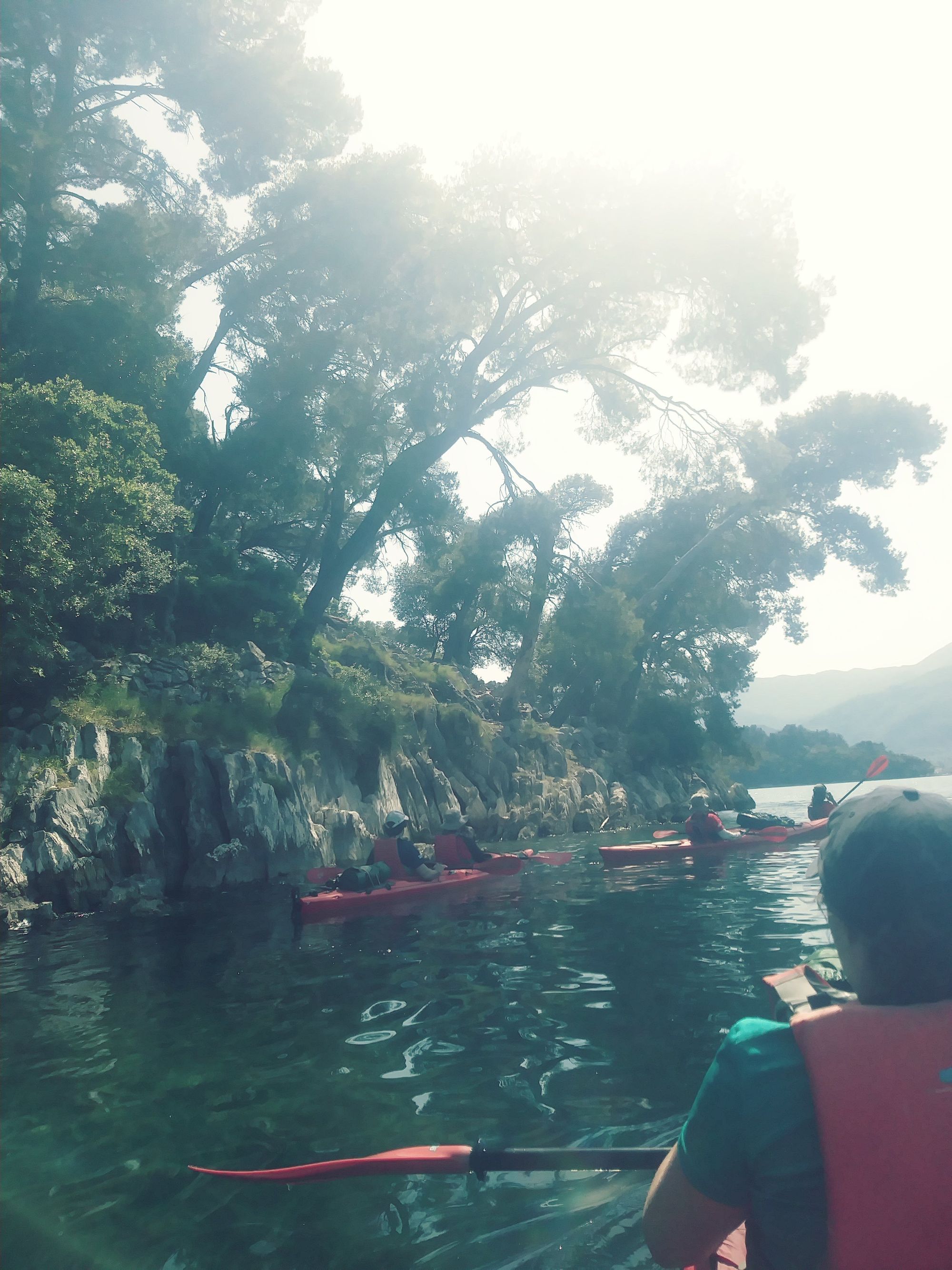 A kayaking group in Skorpios Madouri, Greece