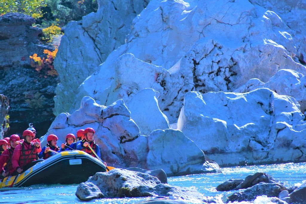 A group white water rafting in an Albanian river.