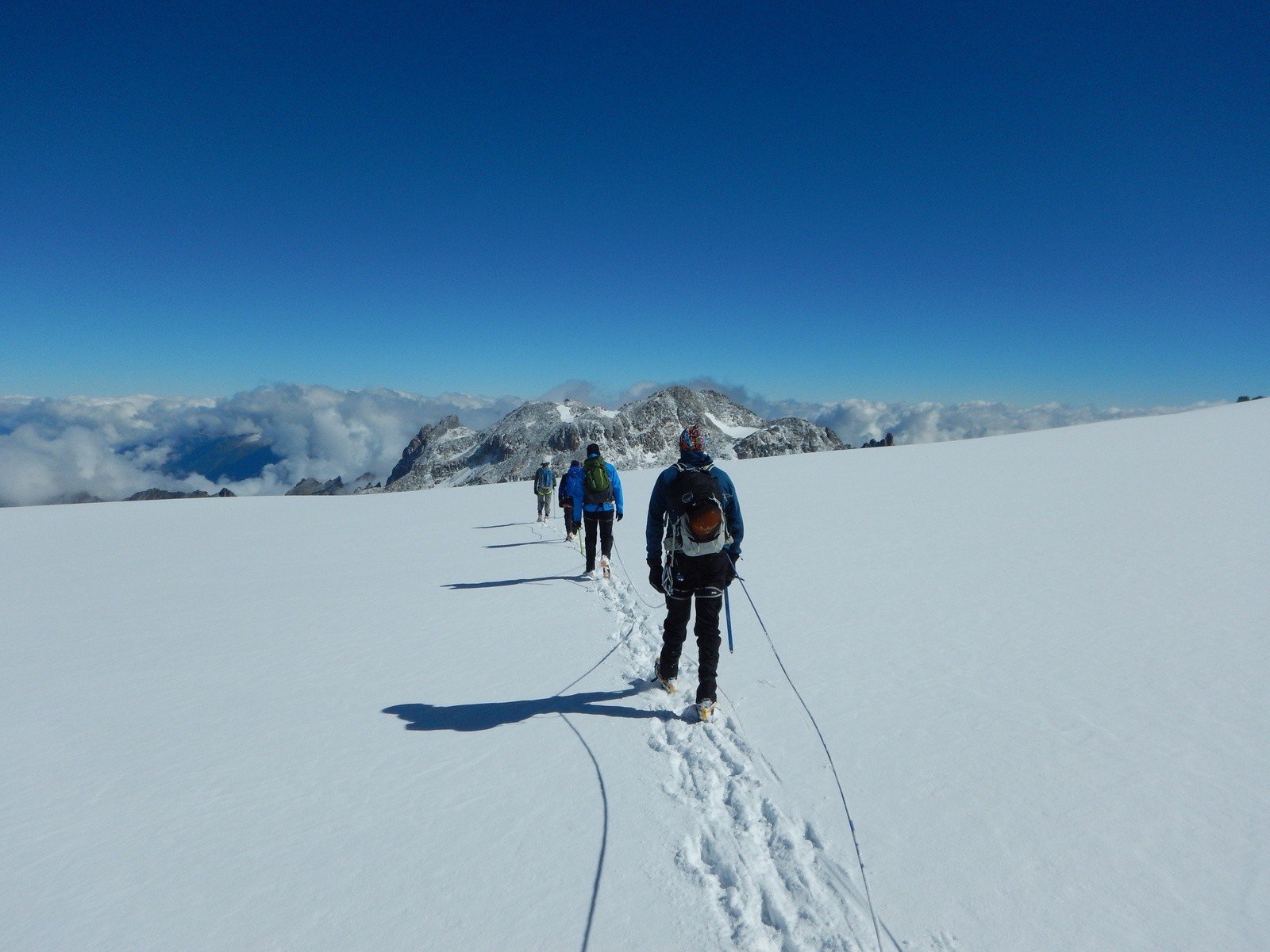 Hikers roped together on Mont Blanc, in the snow