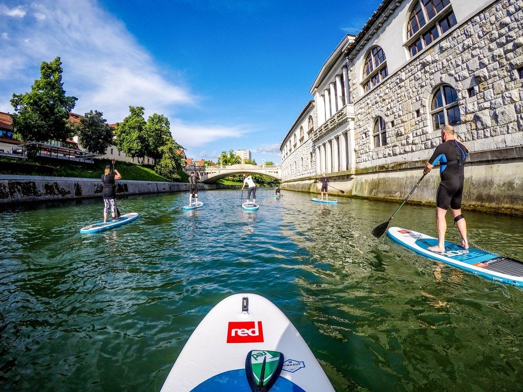 A group on SUPs in the Ljubljana River, which runs through Slovenia's capital.