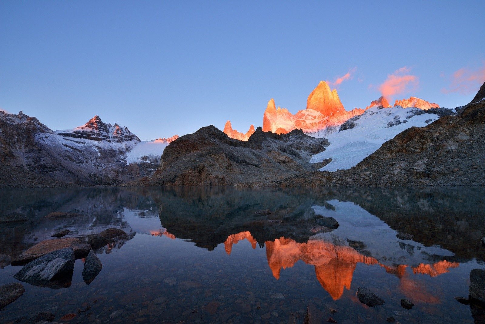 Torres del Paine, the rocks gleaming orange in the sunset.