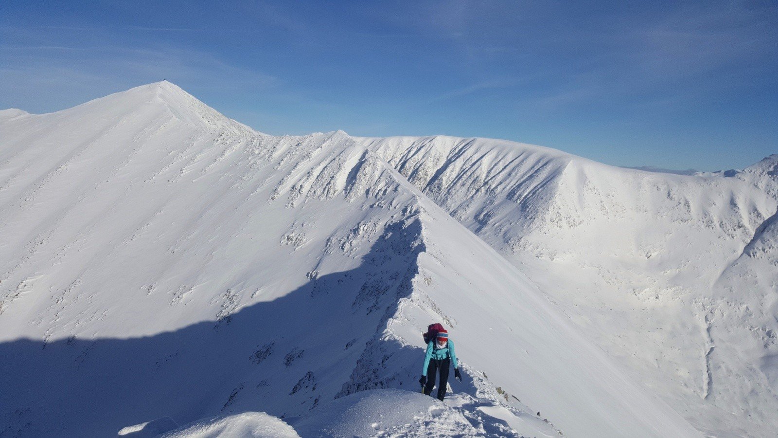 Climbing Ben Nevis on the CMD route in winter. This is the highest mountain in the UK.