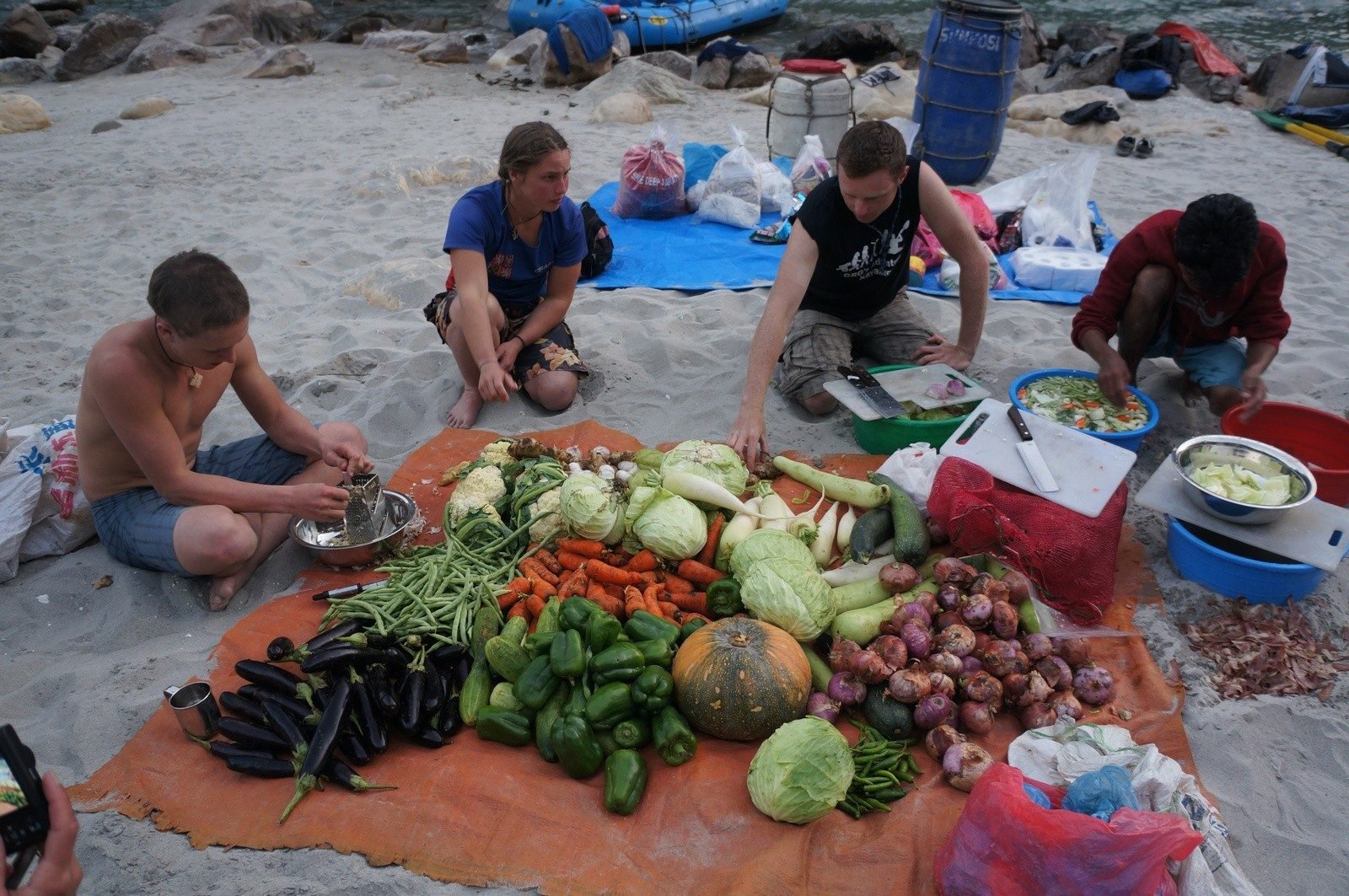 Sitting down for lunch after a day of rafting on the Sun Kosi river.