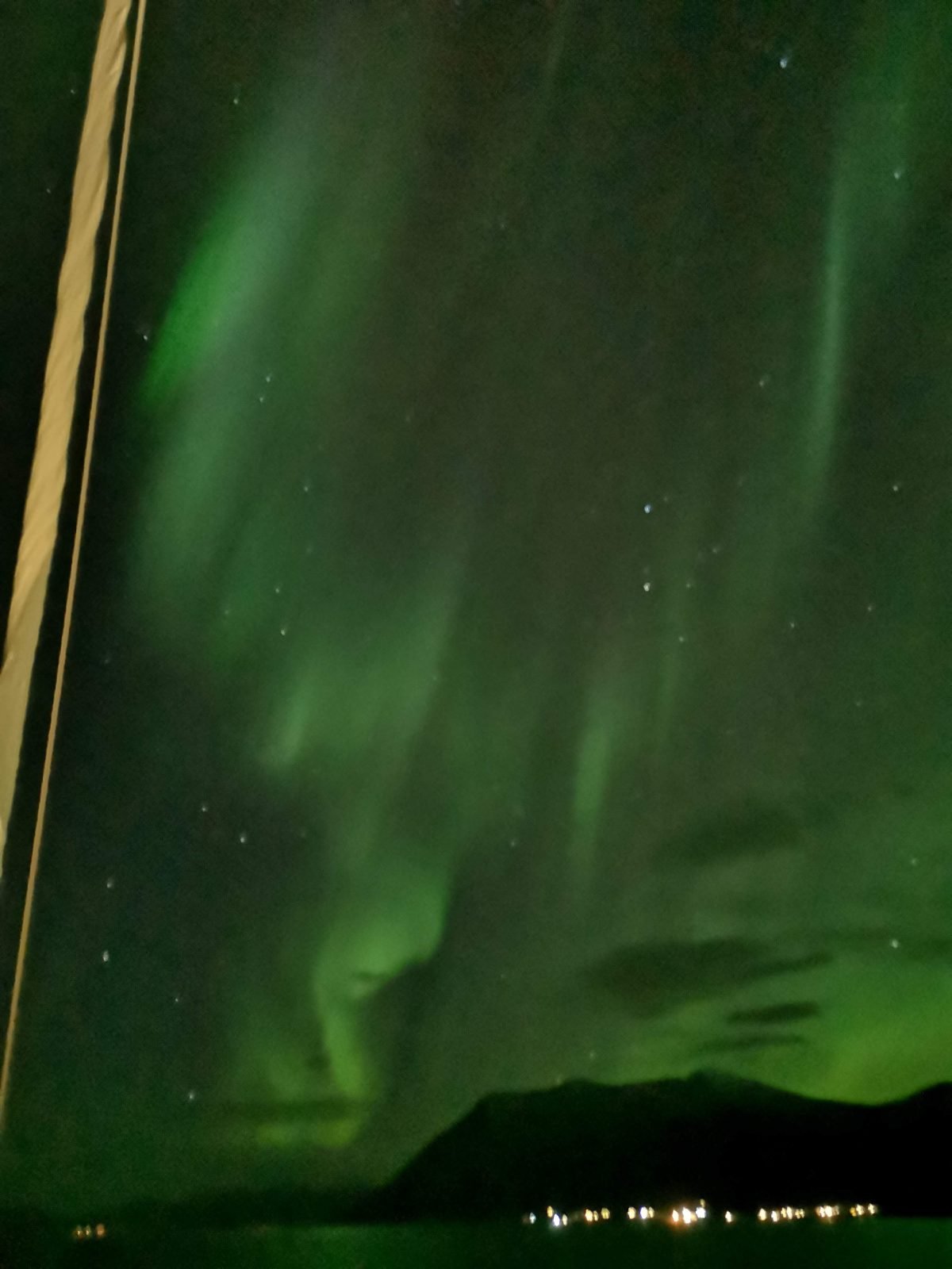 The aurora borealis in Norway, above the Arctic town of Tromso.