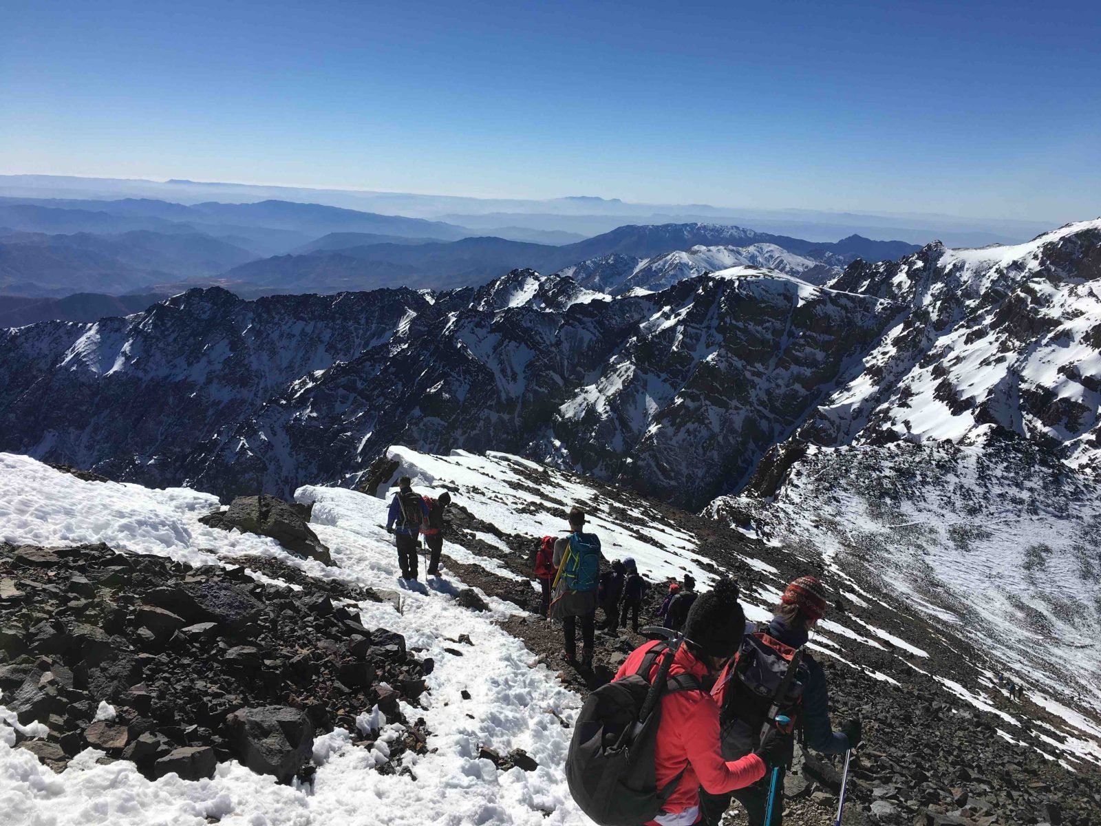 Hikers climbing Mount Toubkal.