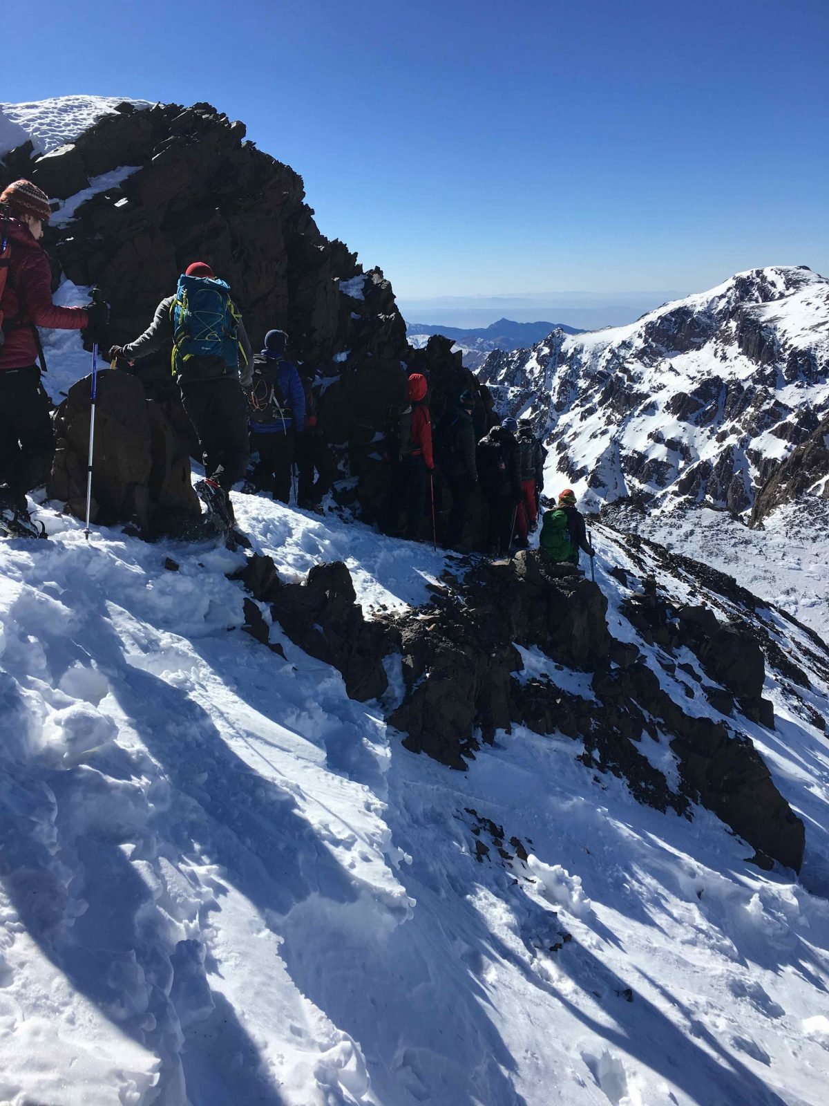 Hikers pushing to the summit of Mount Toubkal, on a Much Better Adventures trip.