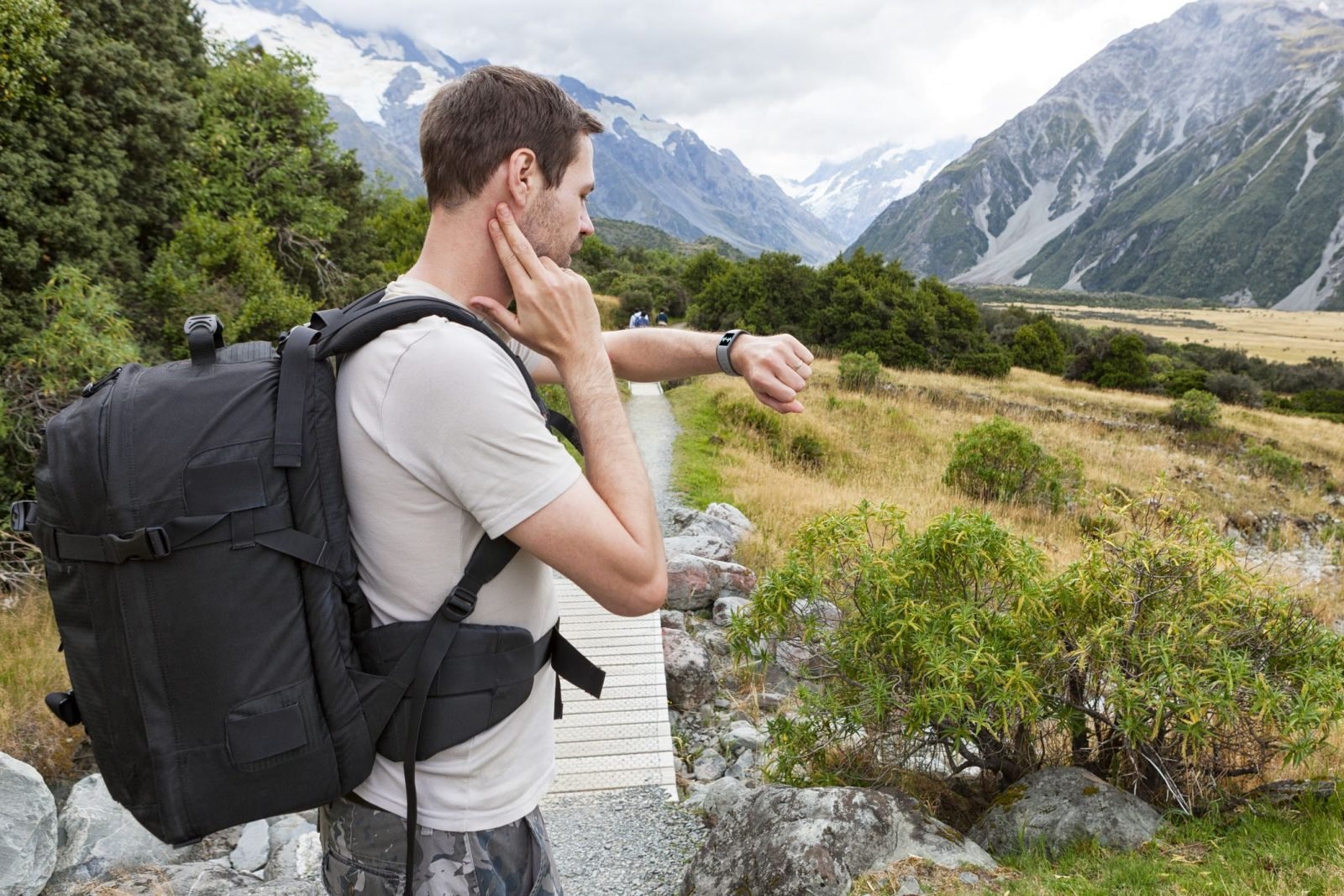 hiker with smart watch 