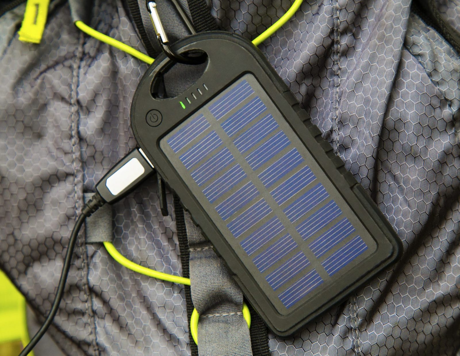 A close up of a solar charger for phones.