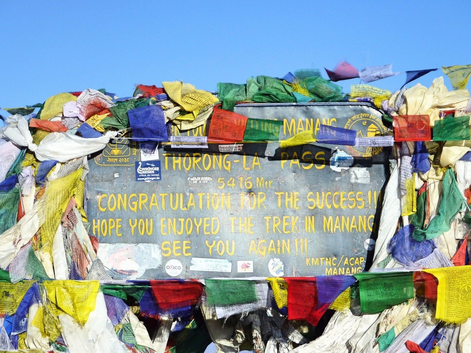 The sign at the top of Thorong La Pass, in Nepal