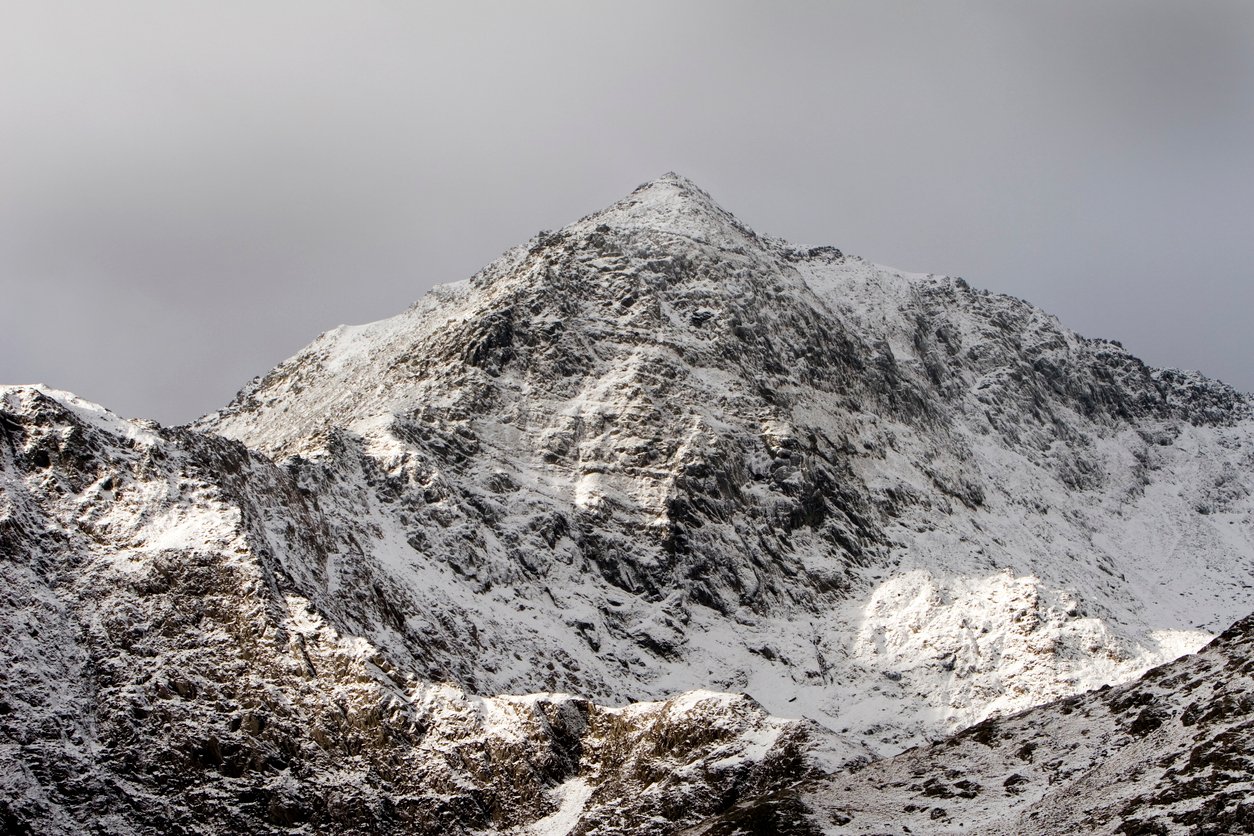 The imposing massif of Snowdon in winter, seen from the Pen y Pass side. The highest mountain in Wales.