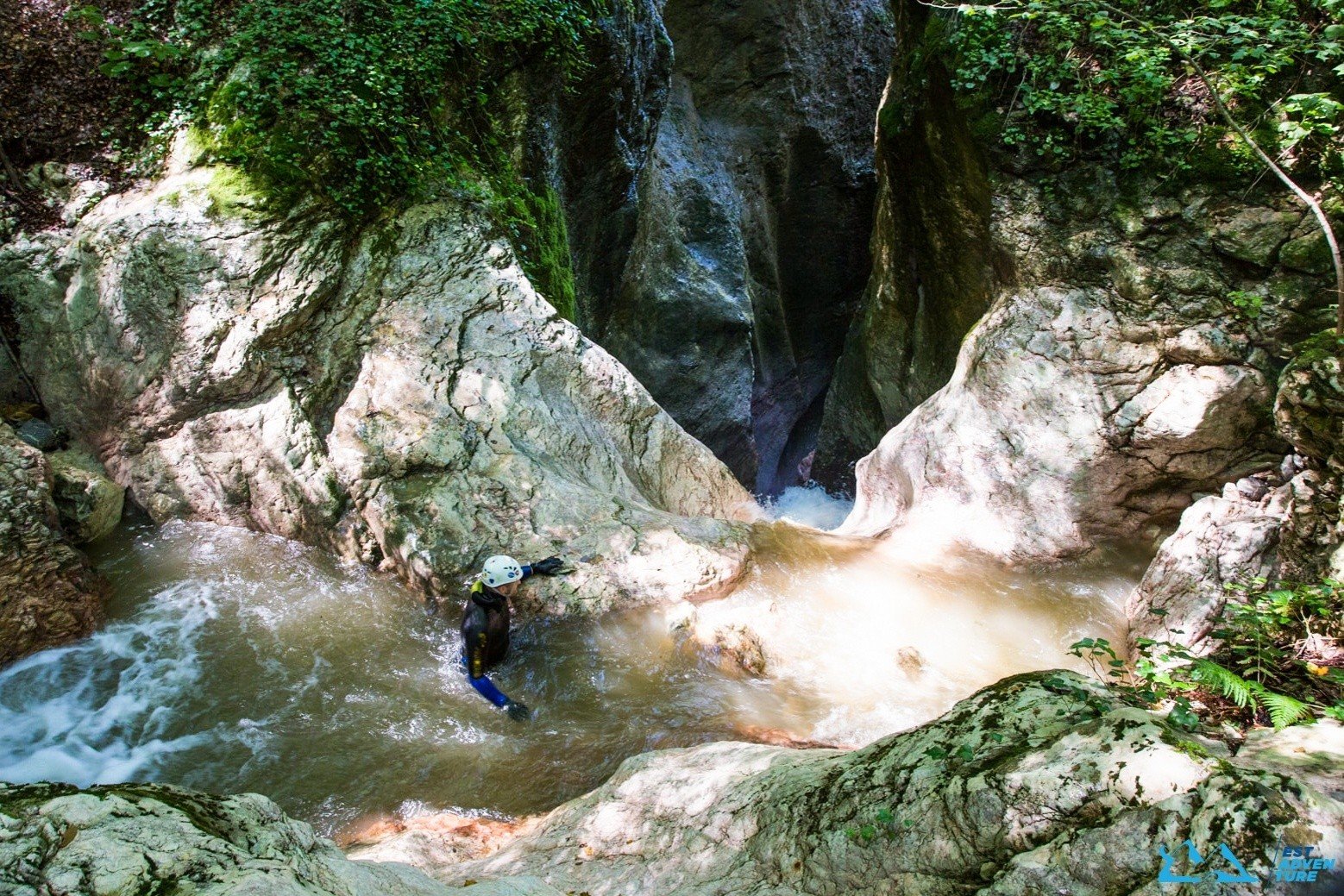 A lone man canyoning a river in Serbia's Valjevo Mountains 