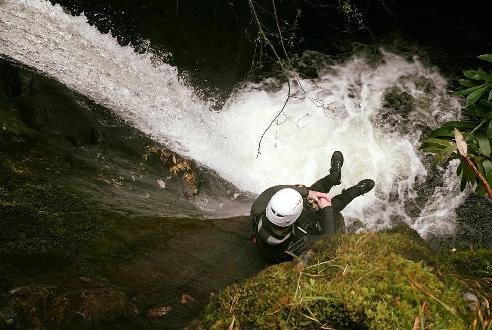 Canyoning down a waterfall near Ben Nevis