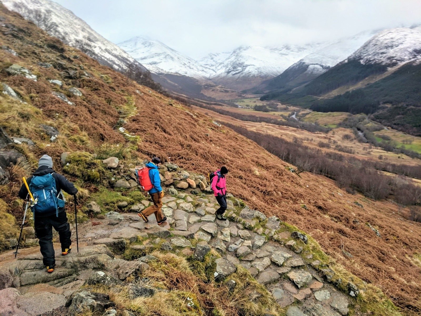 Hikers walk down Scotland’s Glen Nevis valley, the gateway to Ben Nevis
