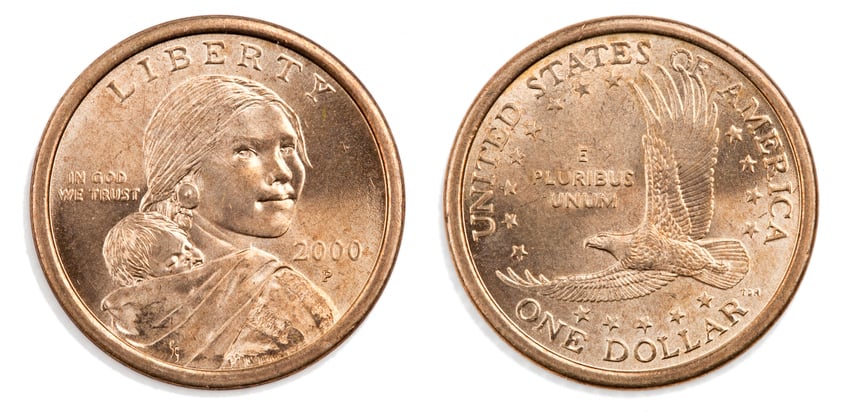 A US dollar coin with a picture of Sacagawea.