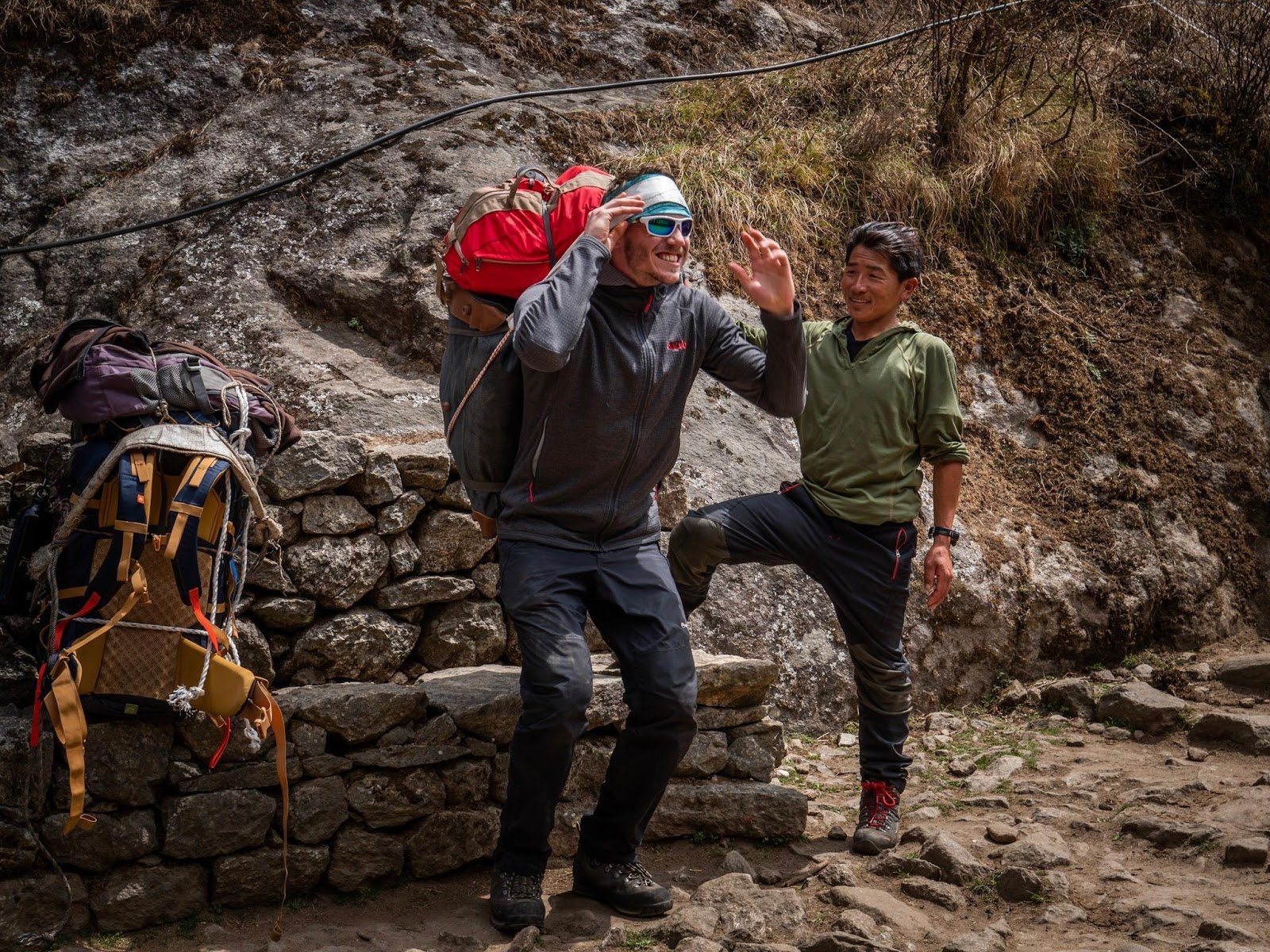 Hiker carrying a heavy backpack