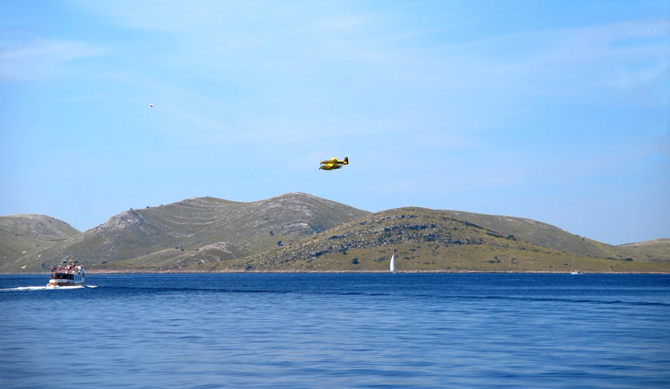 Seaplane flying above Kornati National Park.