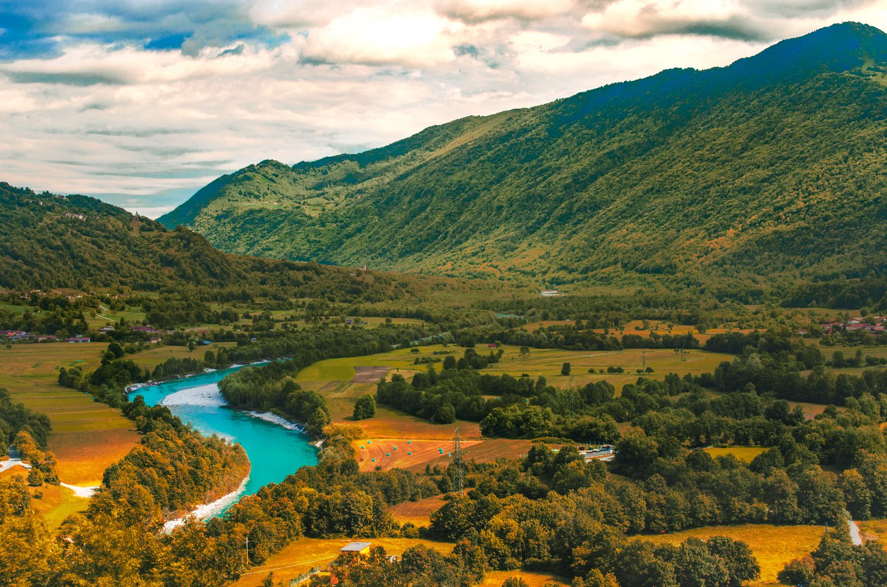 The sun sets on the stunning Soča river in Slovenia